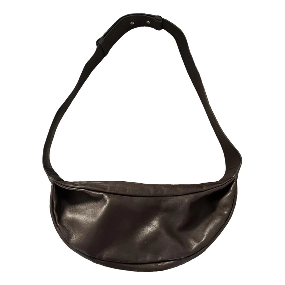 Leather brown crossbody bag from cos. Looks like banana bag from the row